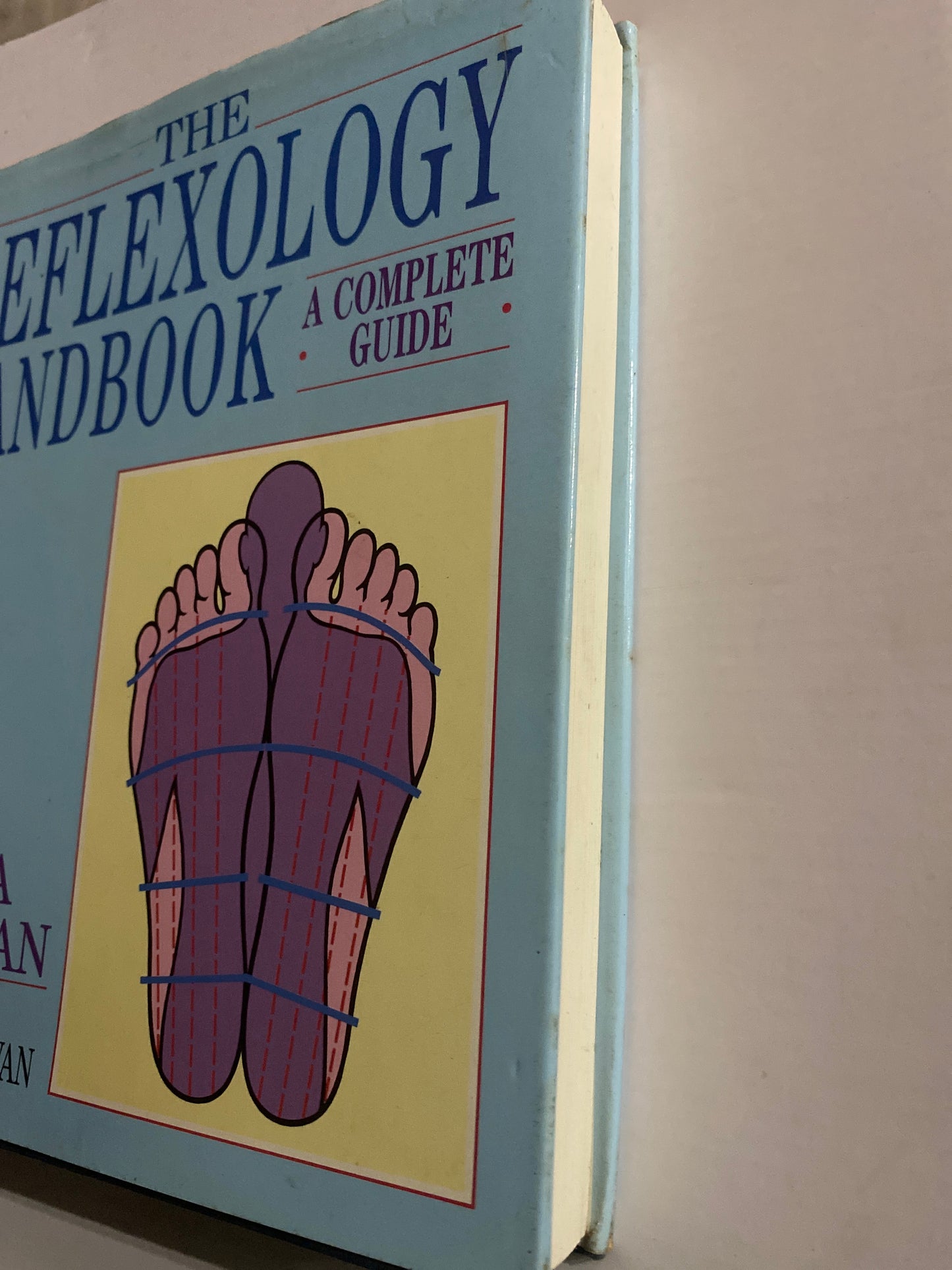 The Reflexology Handbook – Laura Norman & Thomas Cowan (Pre-Loved Hardcover)