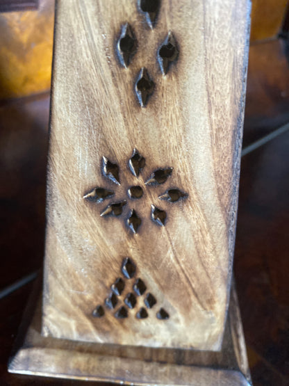 wooden incense burner with patterns