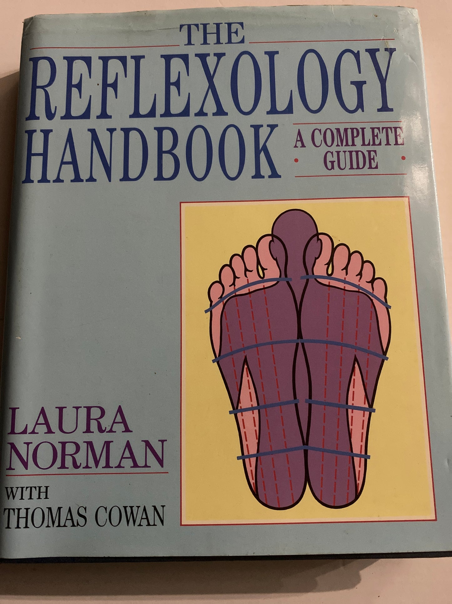 The Reflexology Handbook – Laura Norman & Thomas Cowan (Pre-Loved Hardcover)