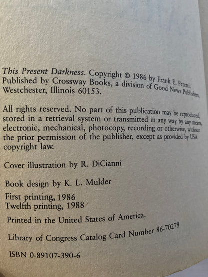 This Present Darkness & Piercing the Darkness by Frank E. Peretti
