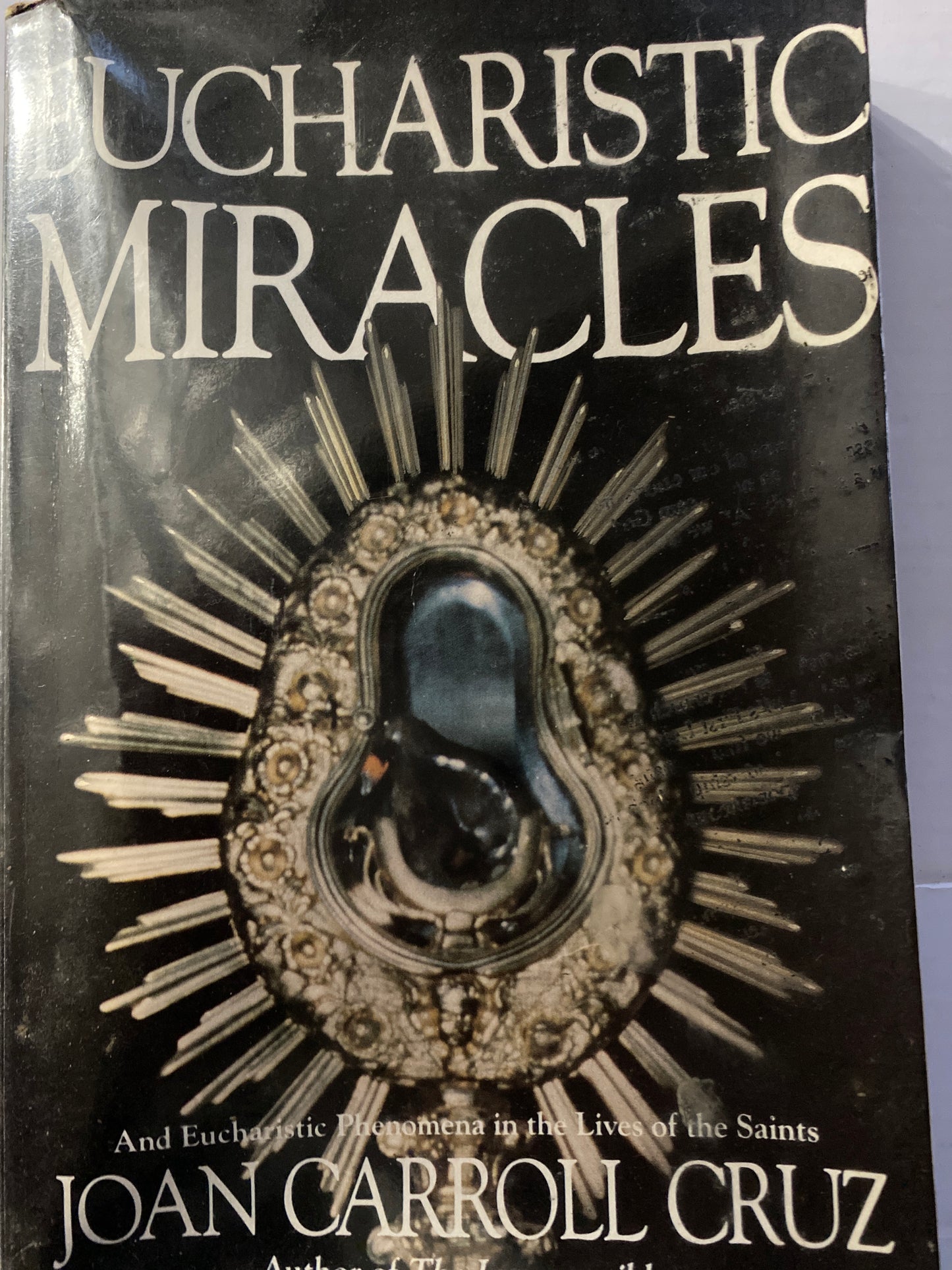 Eucharistic Miracles: And Eucharistic Phenomena in the Lives of the Saints