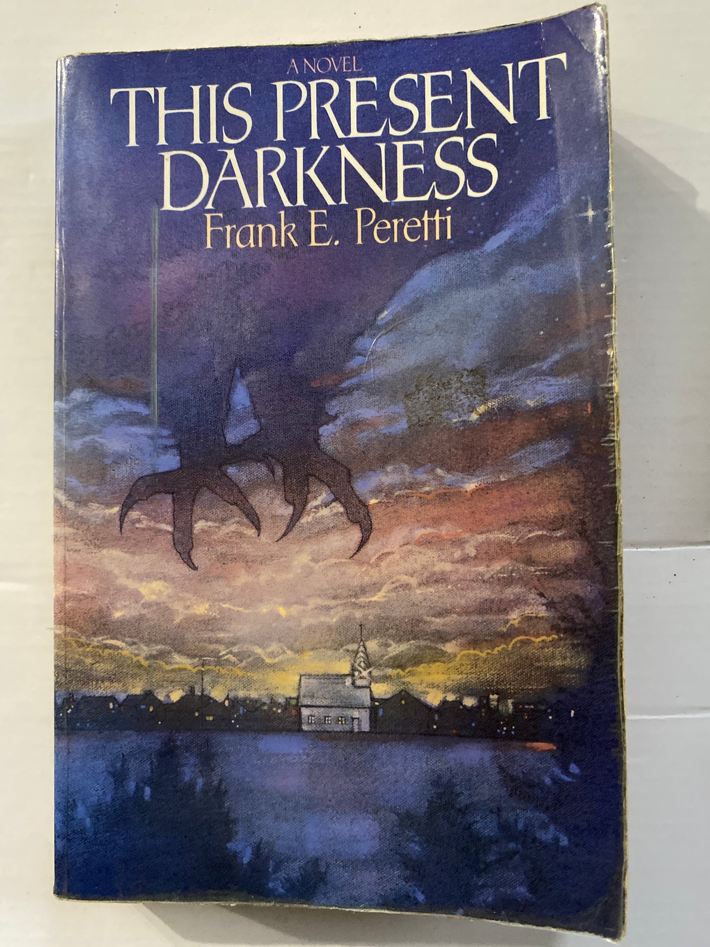 This Present Darkness & Piercing the Darkness by Frank E. Peretti