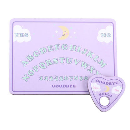 A lavender purple goodbye ouija board set with a rectangular board featuring alphabet letters, numbers, and yes/no clouds, alongside a matching heart-shaped tray.
