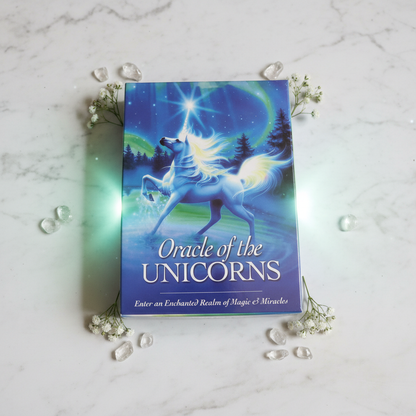 Oracle of the Unicorns premium product mockup with ethereal blue and green aurora lighting and crystals